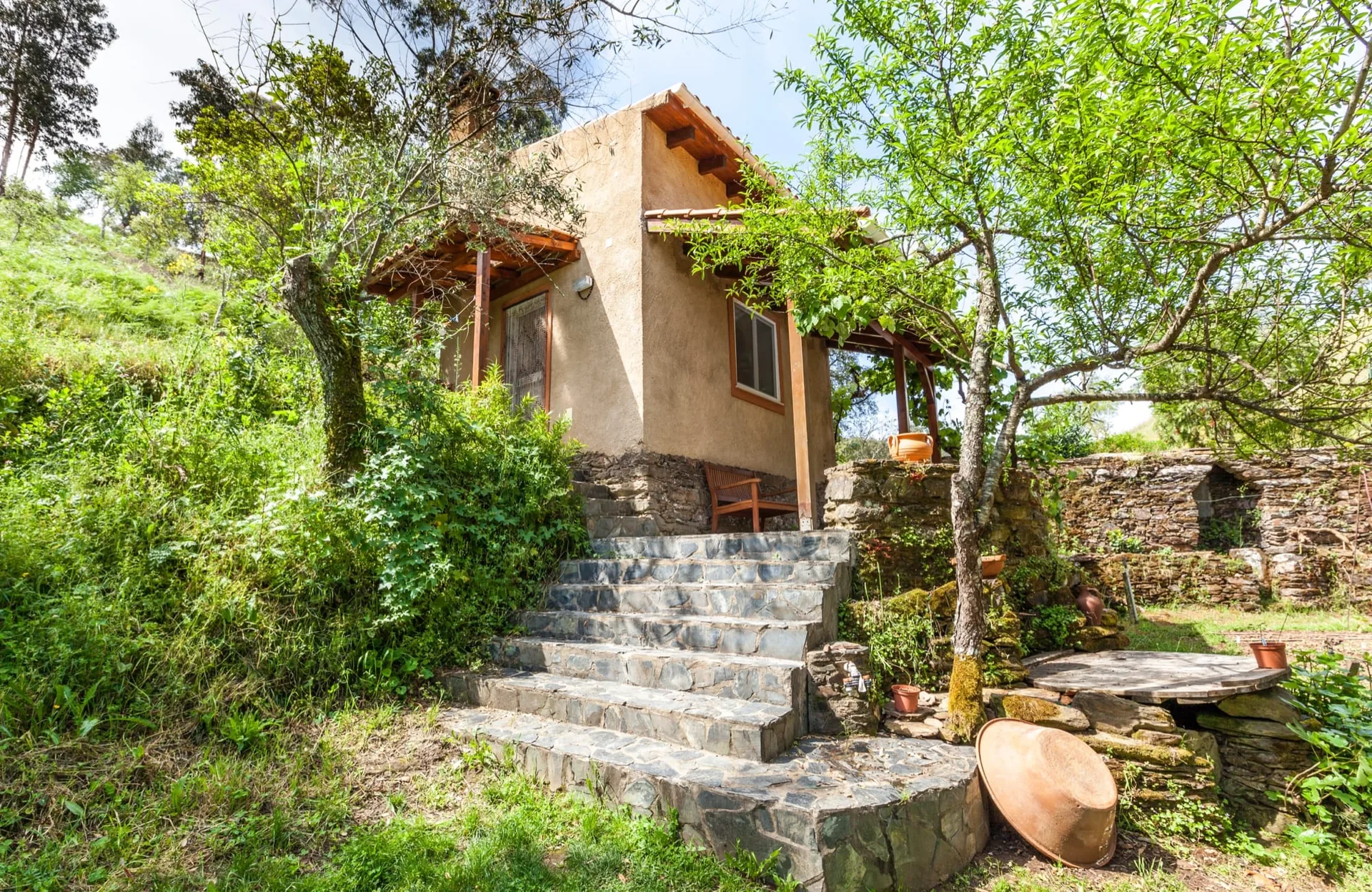 Stone steps up to Casa Mula, the smallest house on the estate