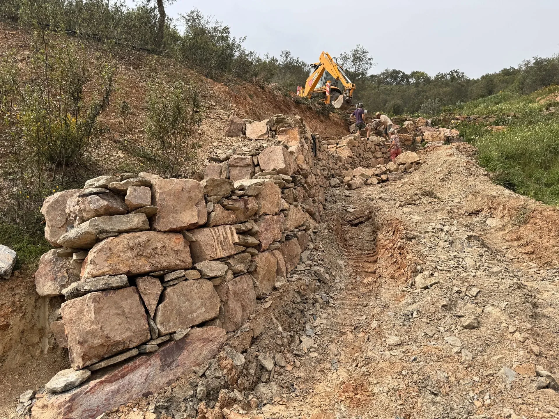 Retaining wall under construction on the hillside